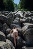 Naked Girl Climbing the Rocks Stream