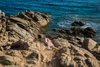Spying on Nudist Girl Sunbathing on Rocks