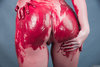 Woman's Nude Ass Painted Red